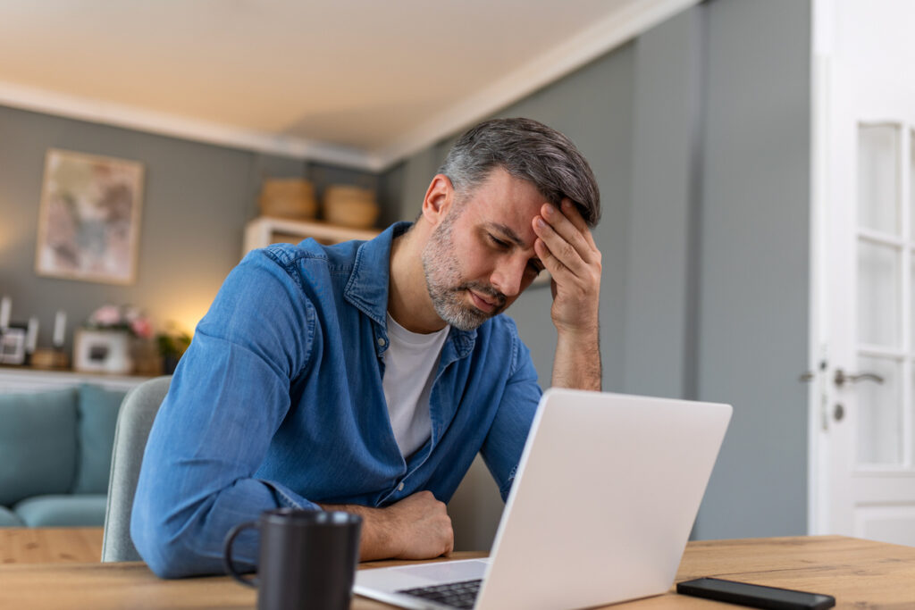 stressed man working at home
